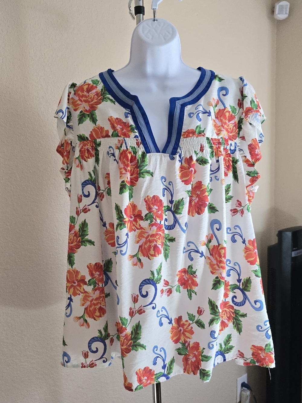 Women's White Floral V-Neck Blouse with Blue Trim